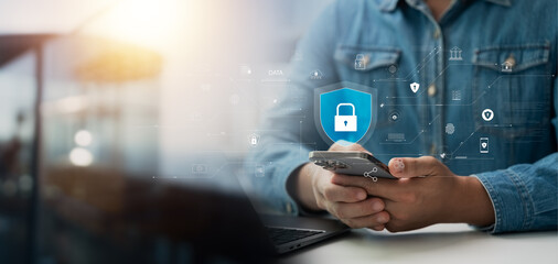 Wall Mural - cyber security concept data protection, businessman using laptop and smartphone security encryption 