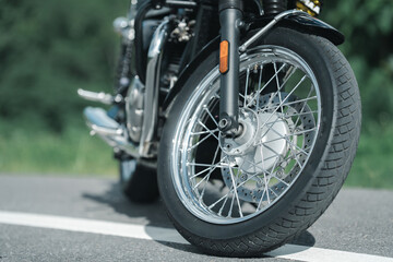 Wall Mural - Motorcycle in a sunny motorbike on the road riding.with sunset light. copyspace for your individual text. classic motorcycle.	