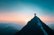 © Stone Story - Silhouette of a person standing on a mountain peak at sunrise, embodying adventure, achievement, and the beauty of nature.