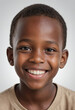 © jarntag - Portrait view of a regular happy smiling Mali boy, ultra realistic, candid, social media, avatar image, plain solid background