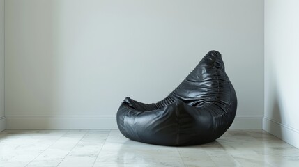 Sticker -  A black bean bag chair sits in a corner of the room, contrasting against the white wall and white tiled floor