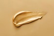 © Anastasiia S - Texture swatch of gold cream on the beige color background. Copy space for text. Concept: advertising beauty photo, skin care product, cosmetic product