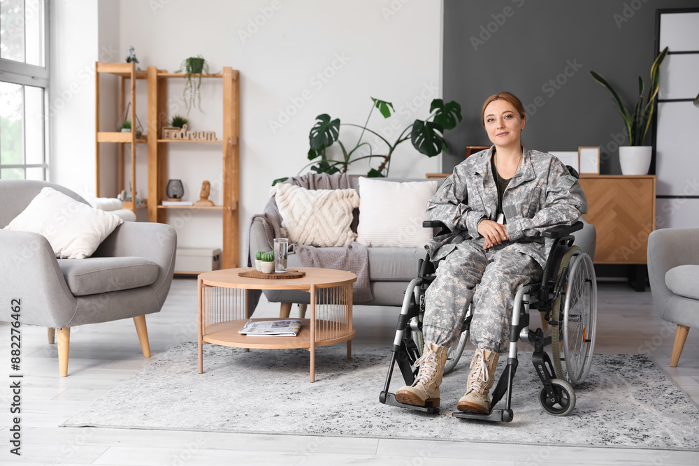 Female soldier in wheelchair at home