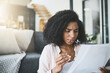 © peopleimages.com - Confused, accounting and tax with woman reading documents in living room of home for bank or planning. Finance, loan and mortgage with person in apartment for investment or savings information