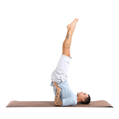 Sticker - Young man doing yoga on mat against white background