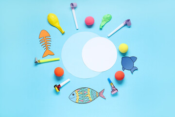 Wall Mural - Blank cards with paper fishes and party decor on blue background. April Fools Day celebration