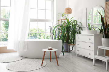 Poster - Interior of bathroom with bathtub, curtain and palm tree