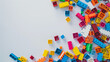 © Cedric - colorful toy building bricks on white background, with copy space