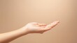 © Natthakan - A hand is shown with a white background