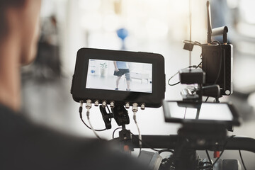 Poster - Screen, shooting and person with videography in production for injury, physio commercial or project. Photographer, equipment and leg with brace in accident, rehabilitation or recording for healthcare