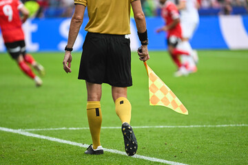 Wall Mural - Assistant of football referee during the match