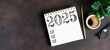 © missmimimina - New year resolutions 2025 on desk. 2025 resolutions list with notebook, coffee cup on table. Goals, resolutions, plan, action, checklist concept. New Year 2025 template, copy space