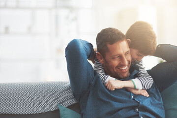 Poster - Father, boy and hug for laughing on sofa together in home, bonding and funny conversation. Daddy, son and happy family playing in living room for joke, talk and embrace for security in relationship