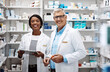 © ReeseArcurs/peopleimages.com - Healthcare, portrait and people with clipboard in pharmacy for dispensary, inventory and inspection. Medical, intern and pharmaceutical student with mentor by pills for supply, management or training