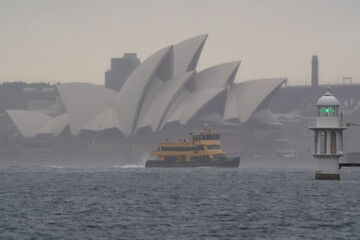 Wall Mural - Ferry boat harbor Sydney Opera House rainy moody ocean day