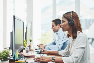 Poster - Call center, woman and computer for communication in office with headphones, man and reading for crm job. People, tech support or telemarketing with voip, listening at contact us for customer service