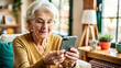 © NewFresh  - Happy senior woman using mobile phone while sitting in armchair at home