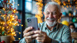 © NewFresh  - Happy senior man using mobile phone at home in Christmas time. Cheerful elderly man using mobile phone.