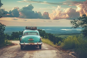 Wall Mural - an old blue car with a suitcase on the back of it