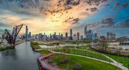 Wall Mural - Iconic panorama view of Downtown Chicago skyline with dramatic colorful sunset sky