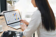 © PRIME STOCK LAB - Professional data analyst using data visualizations dashboard on computer monitor for data business analysis and Data Management System.
