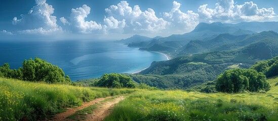 Wall Mural - Serene Coastal Landscape with Lush Green Hills