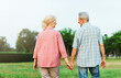 © Lumos sp - woman man outdoor senior couple retirement together walking love holding hands support old nature wife happiness mature elderly