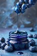 © Anna - a drop of blueberry essential oil. Selective focus