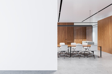 Wall Mural - Office conference room interior with table and armchairs, mockup wall