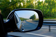 © evgenius1985 - look in the rear view mirror of a car