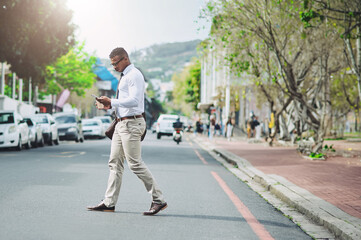 Canvas Print - Business man, walking and phone on city road with morning commute and social media break. Urban, travel and street with professional and mobile text outdoor with online map search and tech of worker