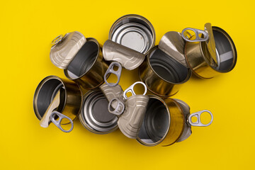 View from above. Recycling concept. Open cans stacked. Recycling materials. color background