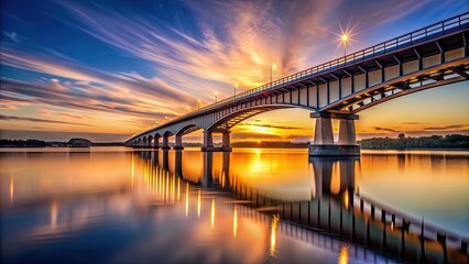 Poster - Beautiful bridge illuminated by the setting sun , sunset, bridge, water, reflection, orange sky, dusk, scenic