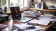 © amorn_m - Laptop, Documents, and Smartphones on a Wooden Desk.
