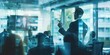 © Boxiang - Engaging business coach delivering a presentation to an audience, with a backdrop of glass walls in a modern setting, emphasizing key points while figures in the blur take notes