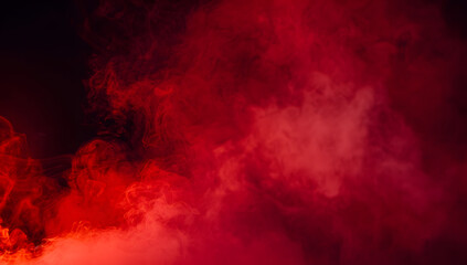 Wall Mural - Abstract red misty fog on isolated black background. Smoke stage studio. Texture overlays. The concept of aromatherapy.