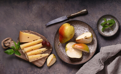 Poster - cheese on a board and fresh fruit for a snack