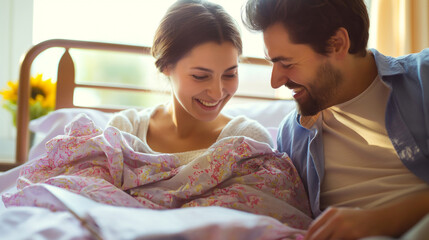 Wall Mural - Proudly smiling couple on hospital bed