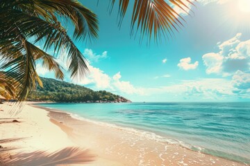 Tropical beach with palm trees and azure water in ocean. Paradise island on a sunny day. Trip, travel and vacation theme