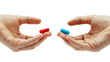 ©  Mohammad Xte - Man Hands Holding Red and Blue Pills, Decision-Making Concept, Choice Between Pills, Health Care Decision, Medication Options, Isolated on White Background