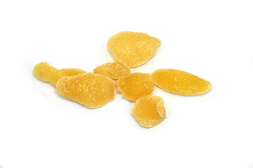 Wall Mural - Dried ginger with sugar on a white background. Dried candied ginger isolated.