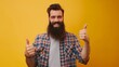 © Berkah - Young handsome man with beard over isolated yellow background with thumbs up because something good has happened.