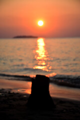 Wall Mural - Beautiful sunset from a distance of small islands around the coast of Tanjung Gelam, Karimunjawa Islands, Central Java, Indonesia
