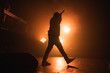© DeShaun Craddock - Silhouette of Live Music Performer on Stage at a Concert