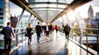 © NHA Studio - Pedestrian Bridge Blur: A blurred pedestrian bridge with city views and pedestrians, suitable for urban connectivity and transportation themes.