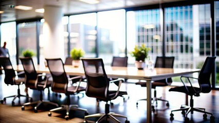 Office Meeting Area Blur - A collaborative meeting area with chairs and tables, blurred.
