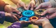 © Agri - Multiracial hands holding colorful gears representing teamwork and cooperation