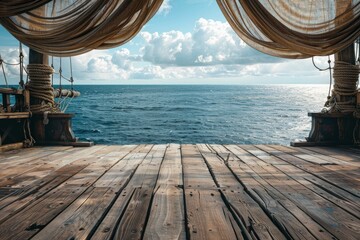 Wall Mural - An empty stage on a pirate ship deck, with wooden planks, tattered sails billowing above, and the ocean horizon in the background. 