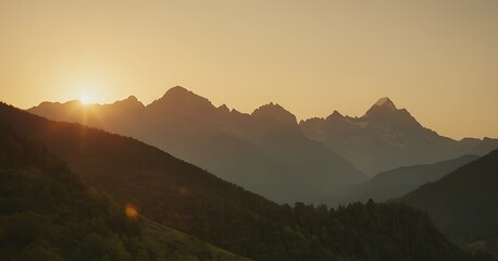 Wall Mural - The sun rising over a majestic mountain range, casting golden hues across the peaks and valleys.