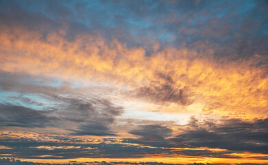 Wall Mural - Sunset in with dramatic storm clouds.